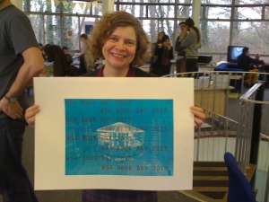 Catherine at World Book Day in the Rotunda, with her souvenir print 